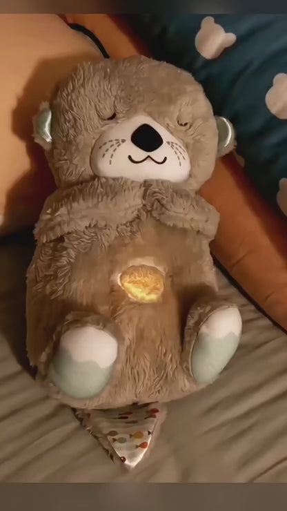 Oso de peluche musical, relajante para un sueño tranquilo.